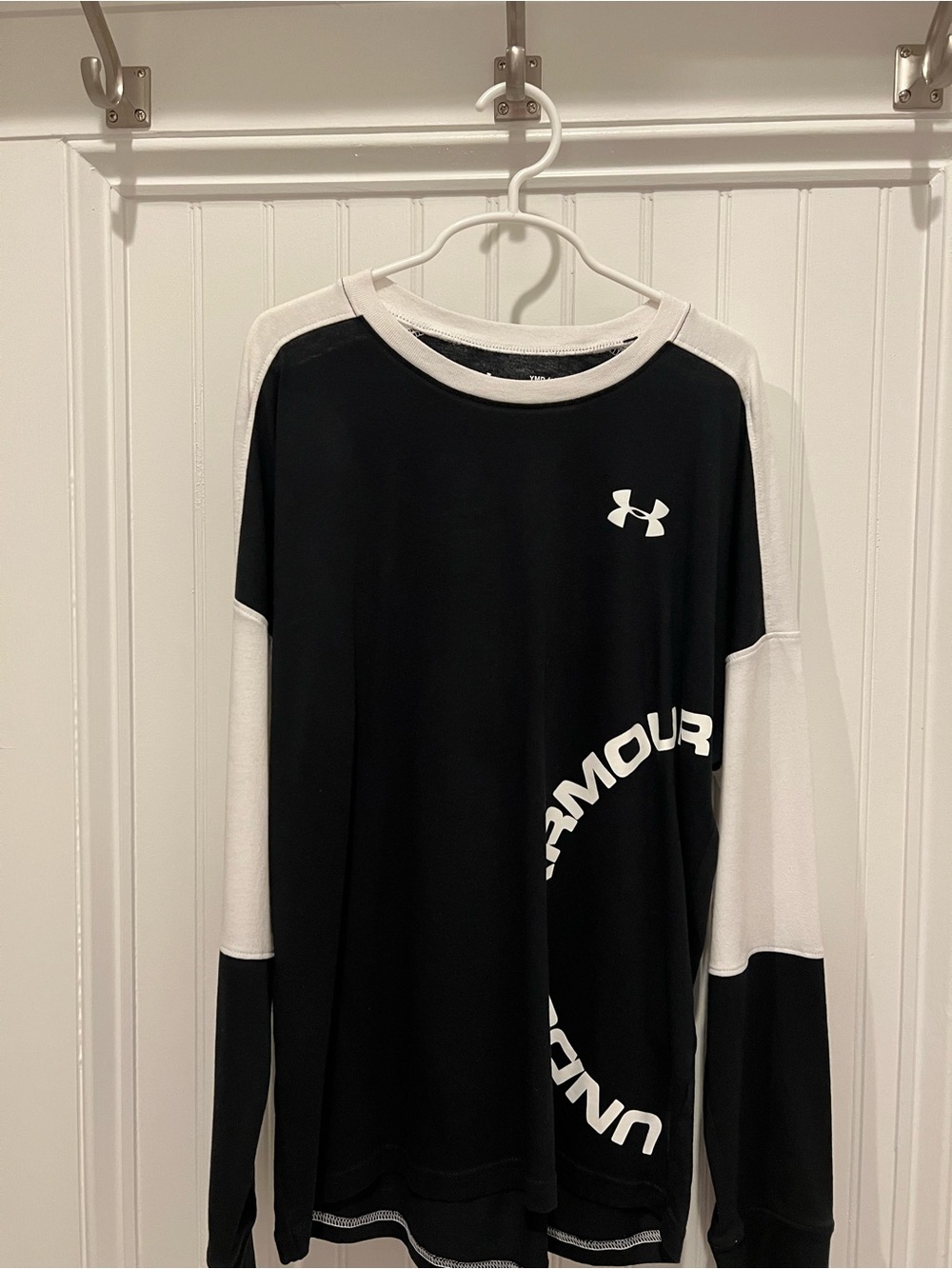 Under Armour brand long sleeve shirt in very good condition, size youth medium